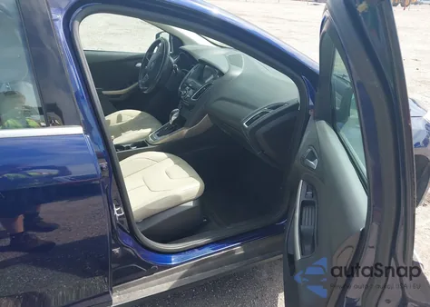 2016 Ford Focus Titanium z USA, uszkodzony, nr VIN 1FADP3N27GL222574